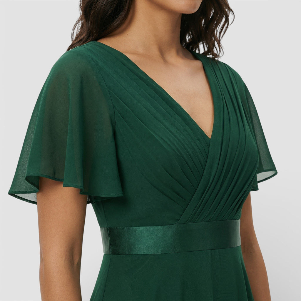 Green pleated v-neck dress