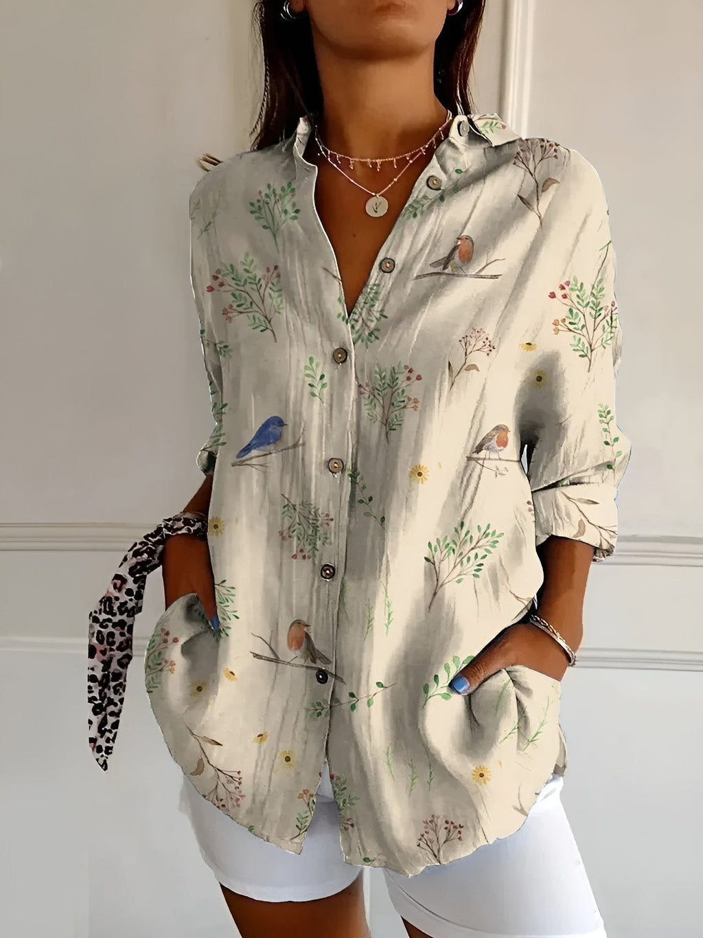 Close-up of floral print detail on women's lightweight blouse
