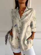 Close-up of floral print detail on women's lightweight blouse