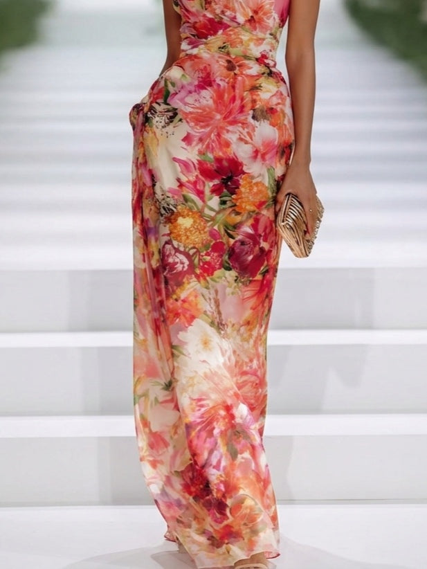 Close-up of red floral print skirt on wedding guest maxi dress
