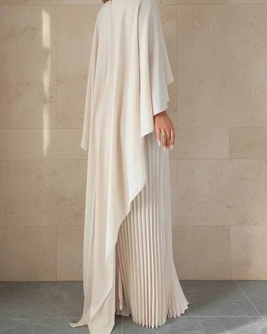 Women's pleated cape maxi dress, back view