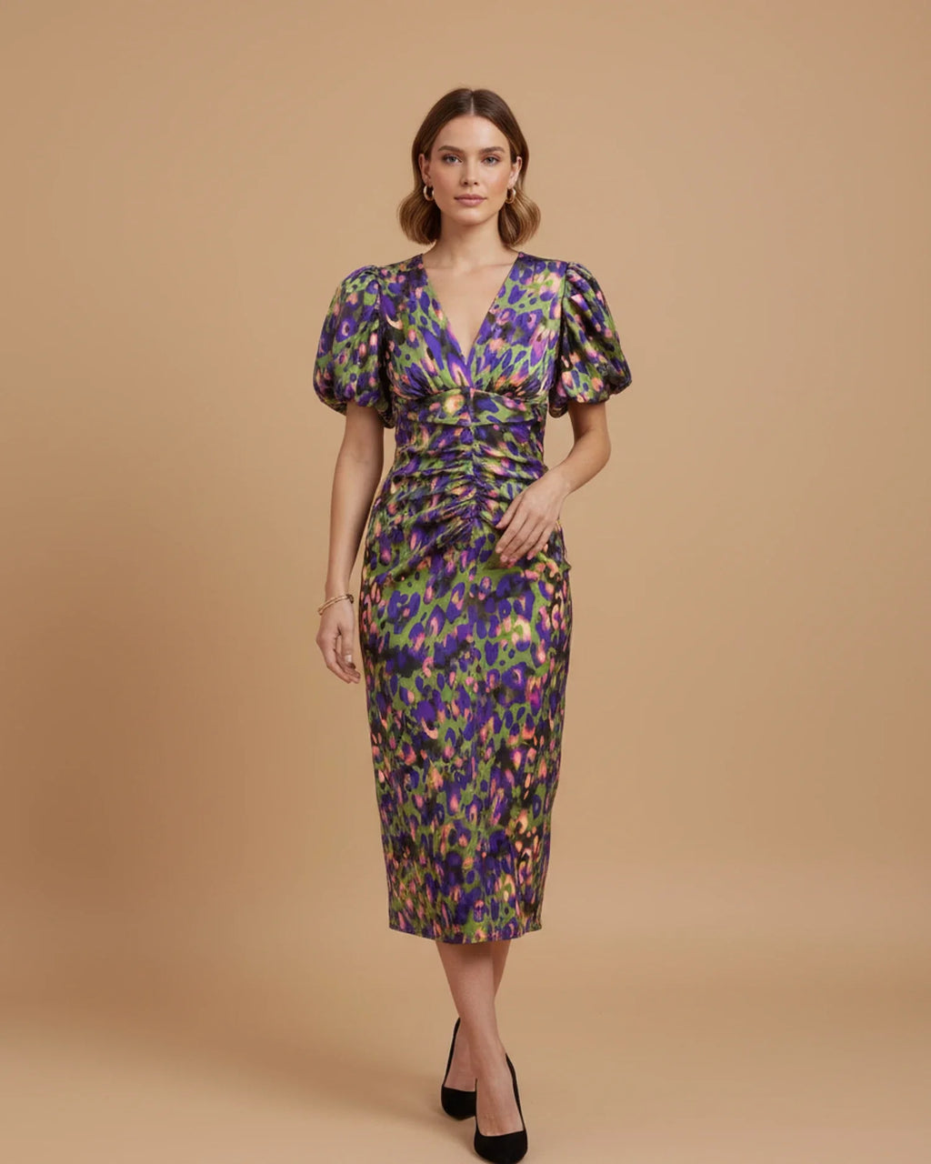 Women's puff sleeve V-neck midi dress, model styled for evening