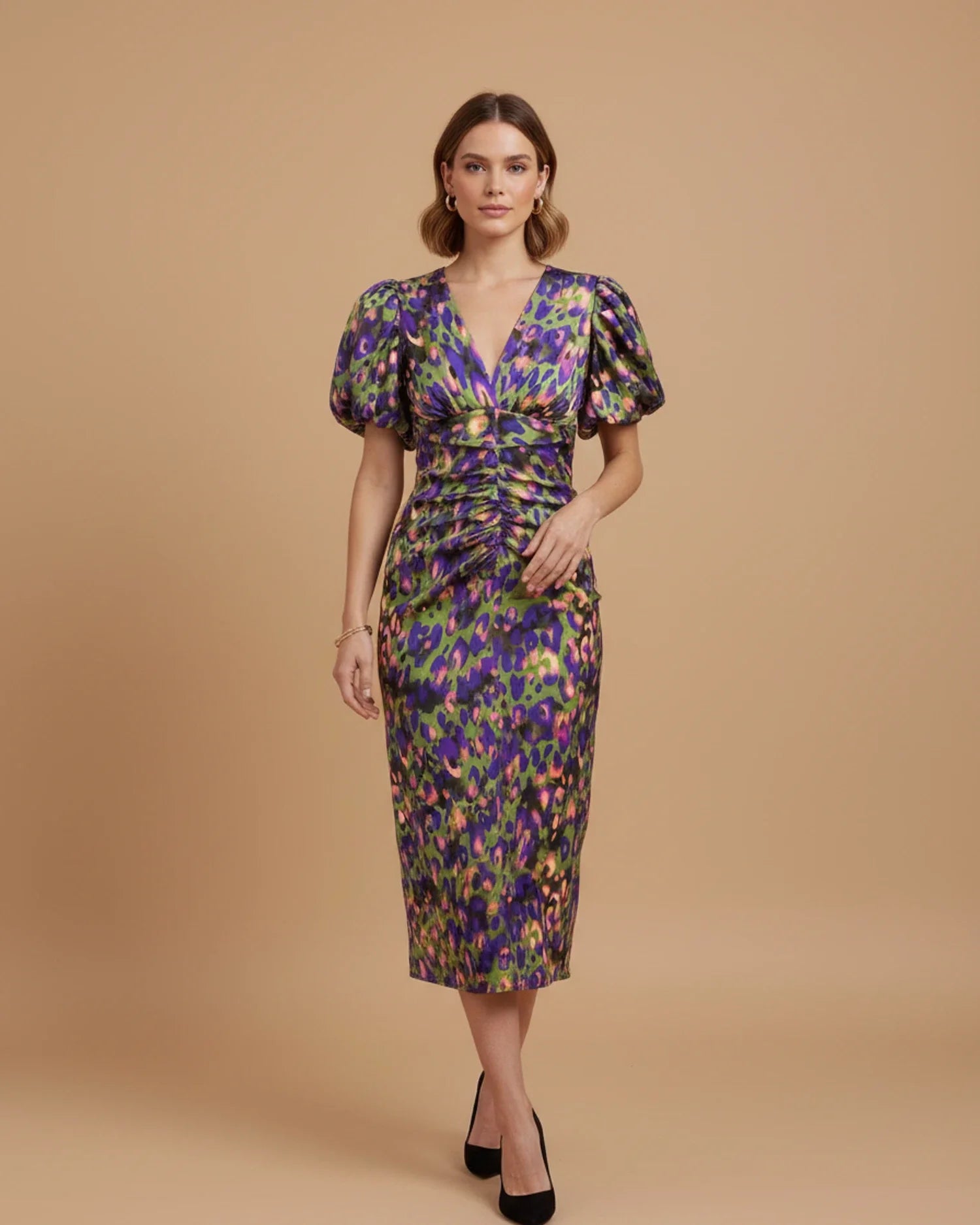 Women's puff sleeve V-neck midi dress, model styled for evening