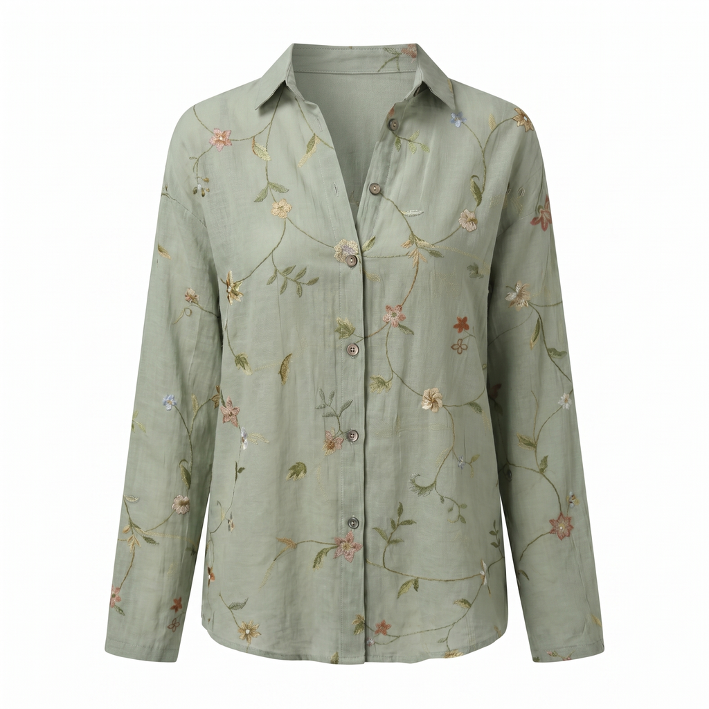 Abstract print split neck blouse in green, product view