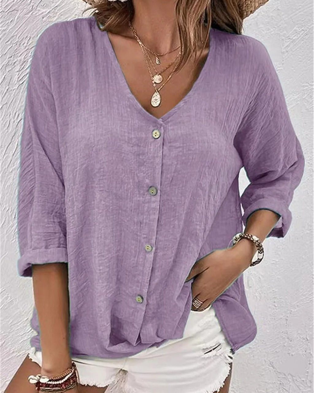 Deep V-neck button-down blouse in light purple, front view