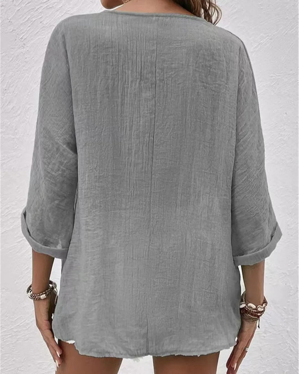 Deep V-neck button-down blouse, open styling view