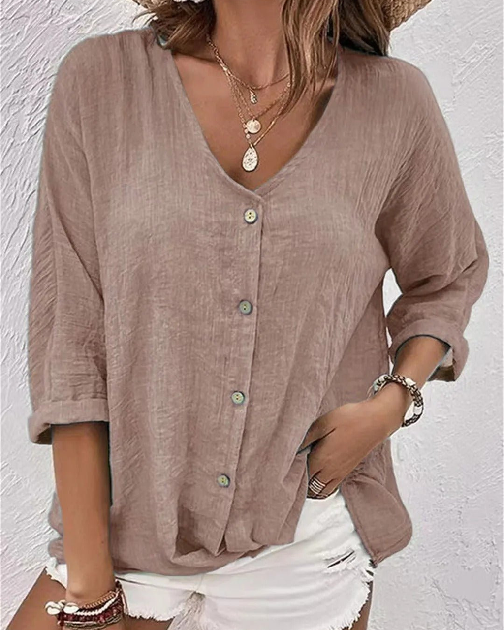 Deep V-neck button-down blouse, back view