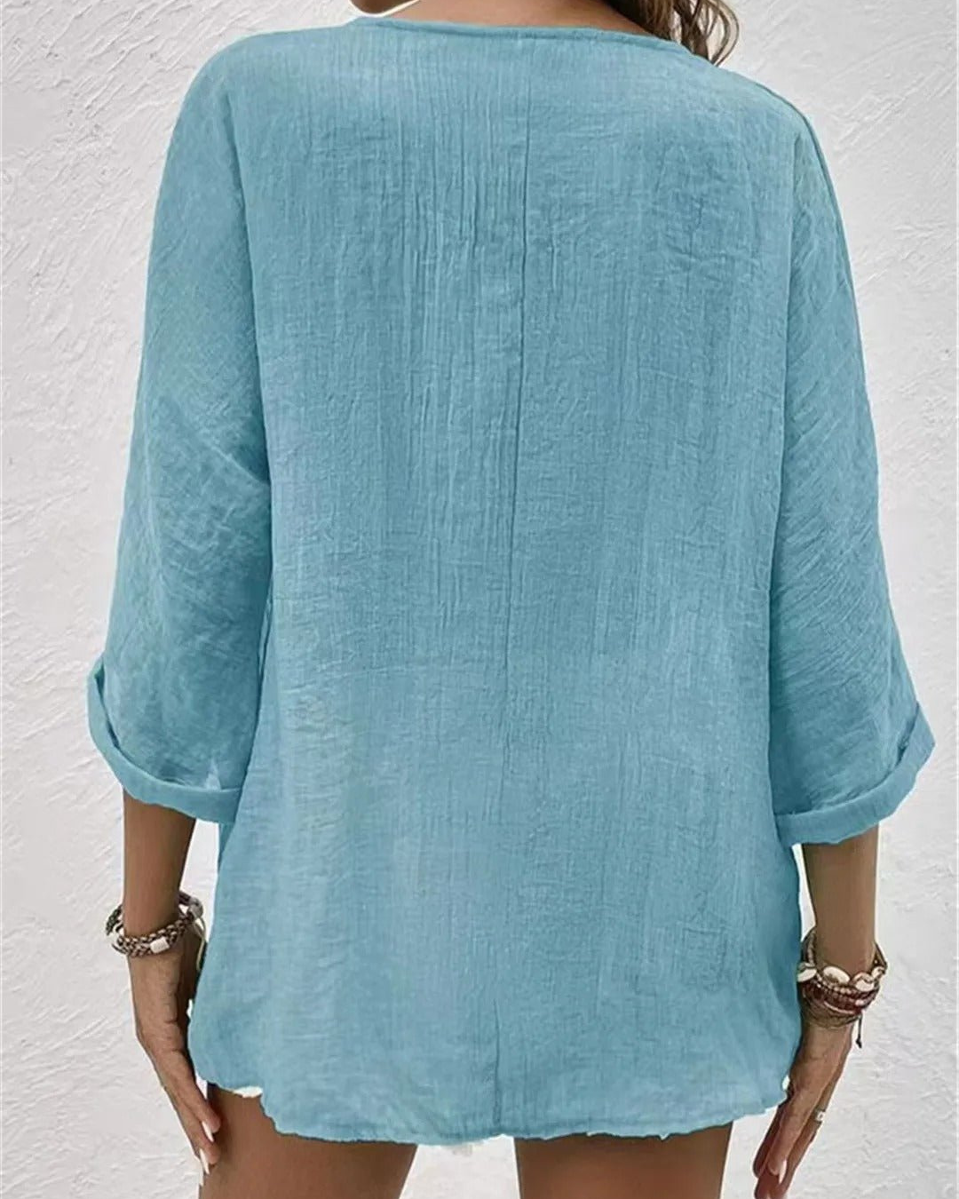 Deep V-neck button-down blouse, lifestyle view