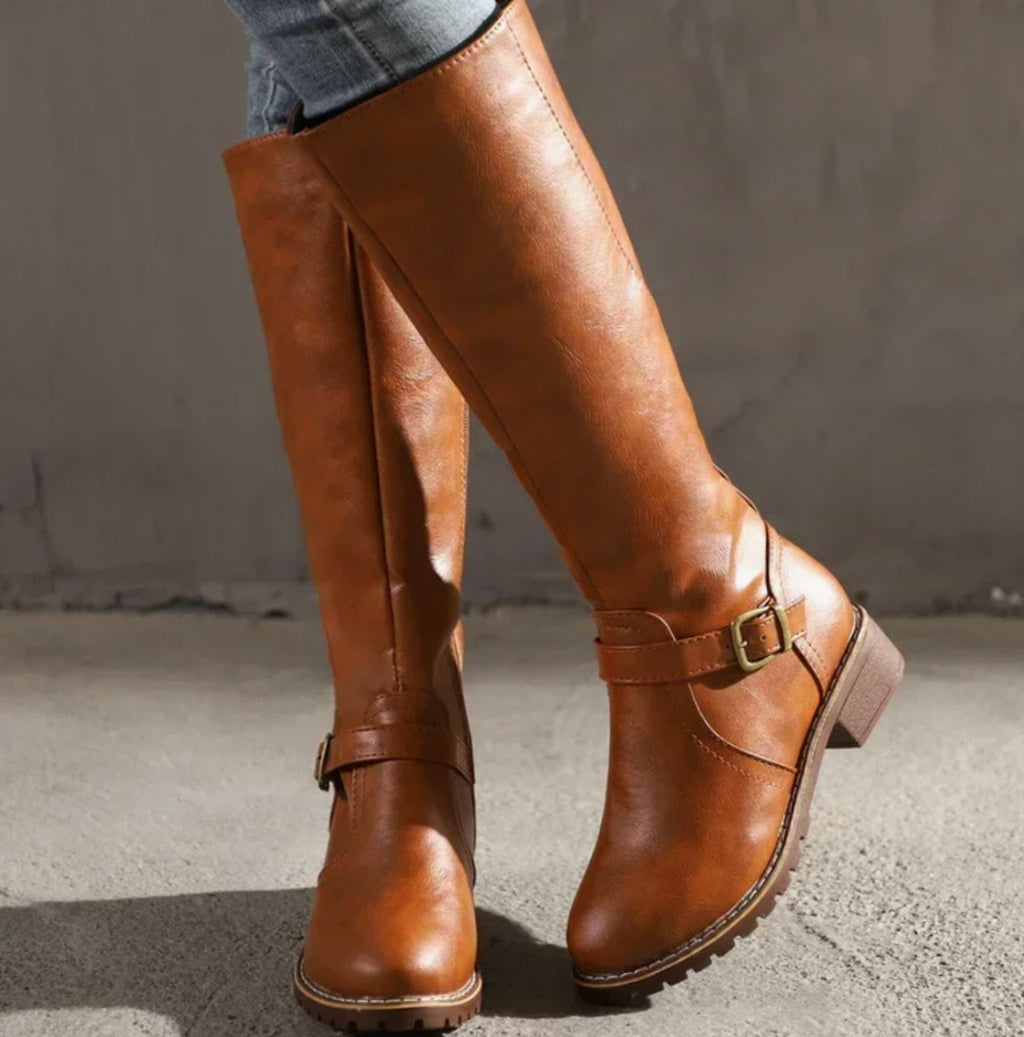 Leather ankle buckle block heel knee high riding boots with a knee high shaft