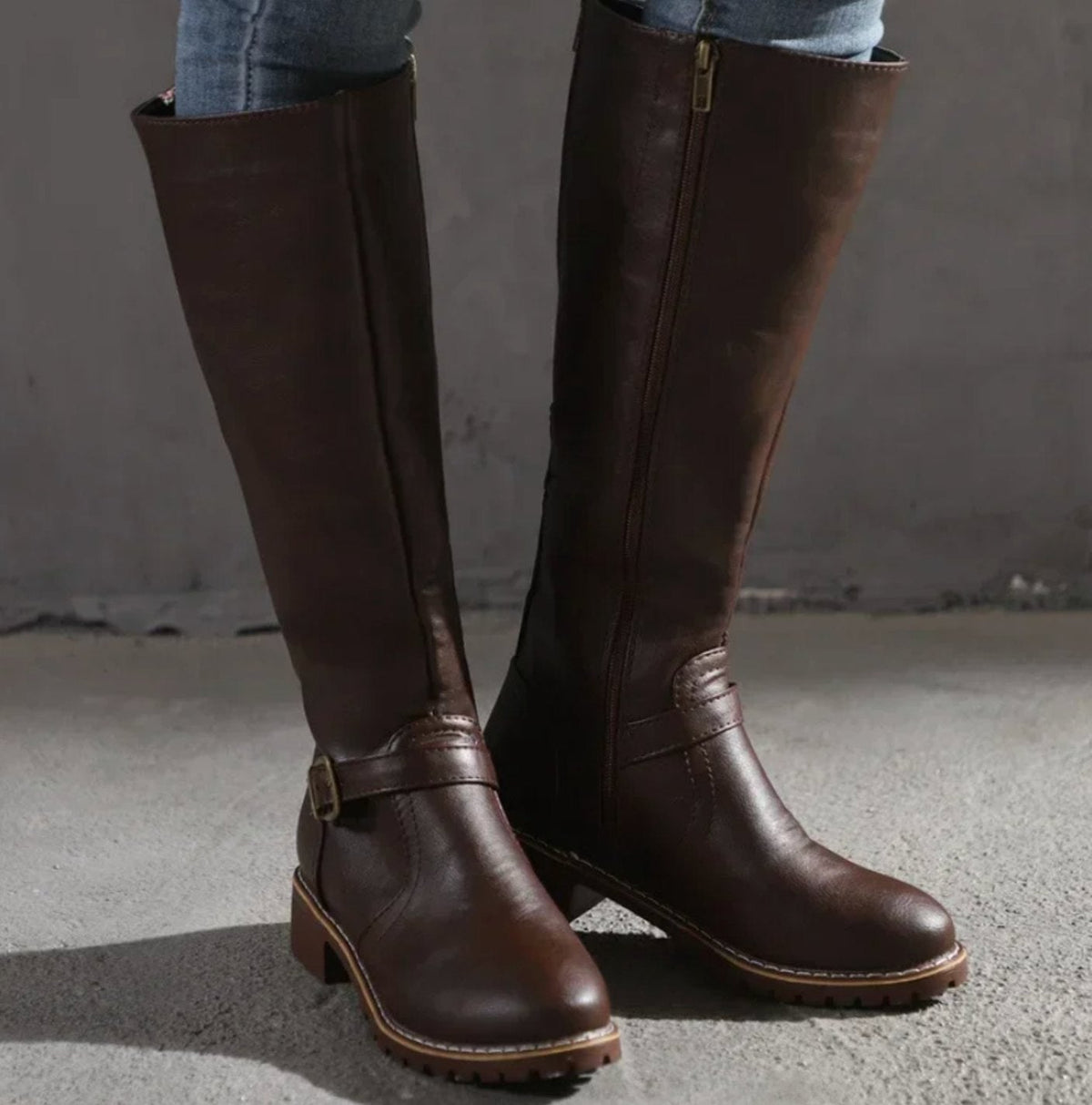Leather ankle buckle block heel knee high riding boots with a low block heel