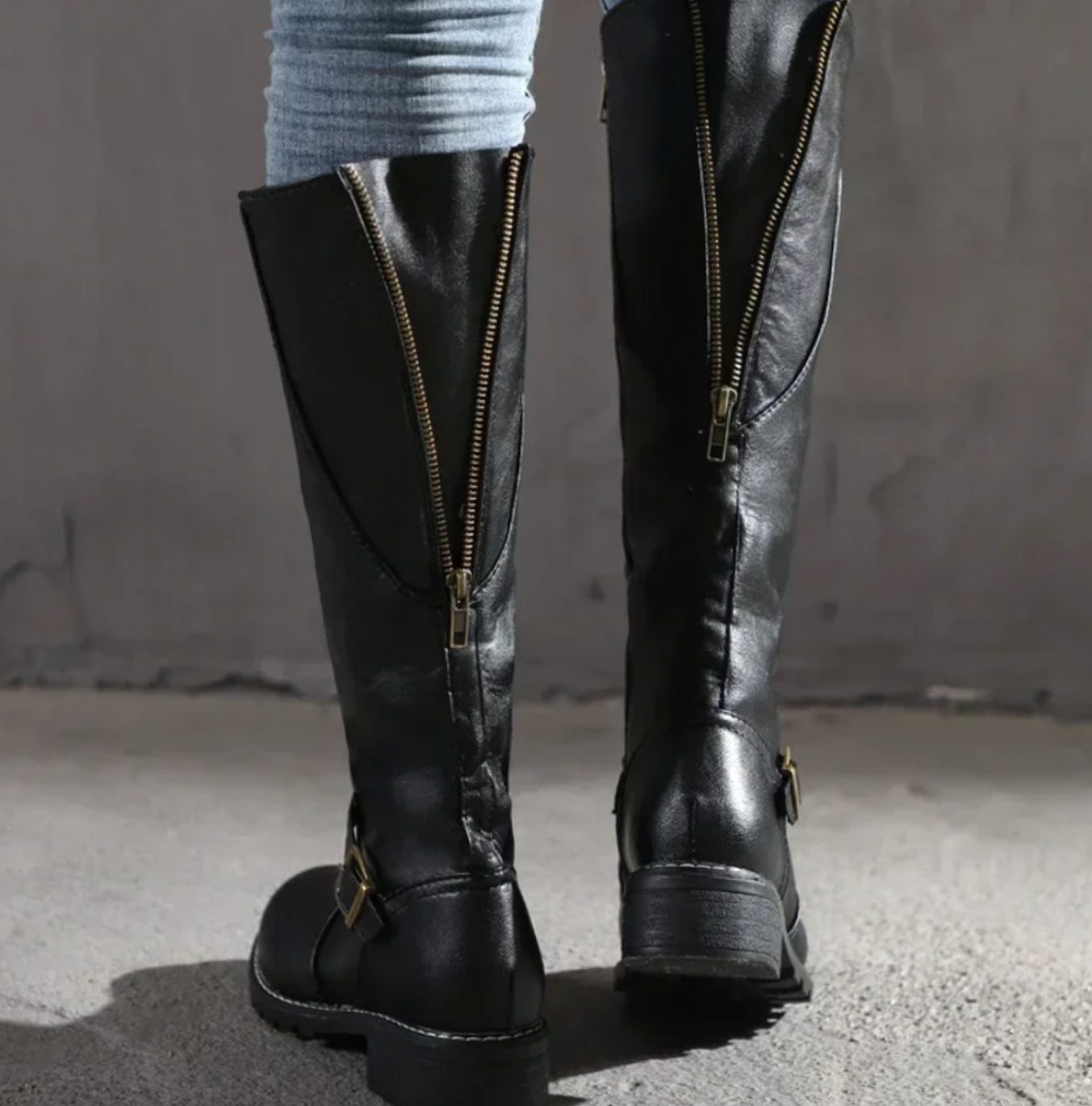 Leather ankle buckle block heel knee high riding boots with a lugged sole
