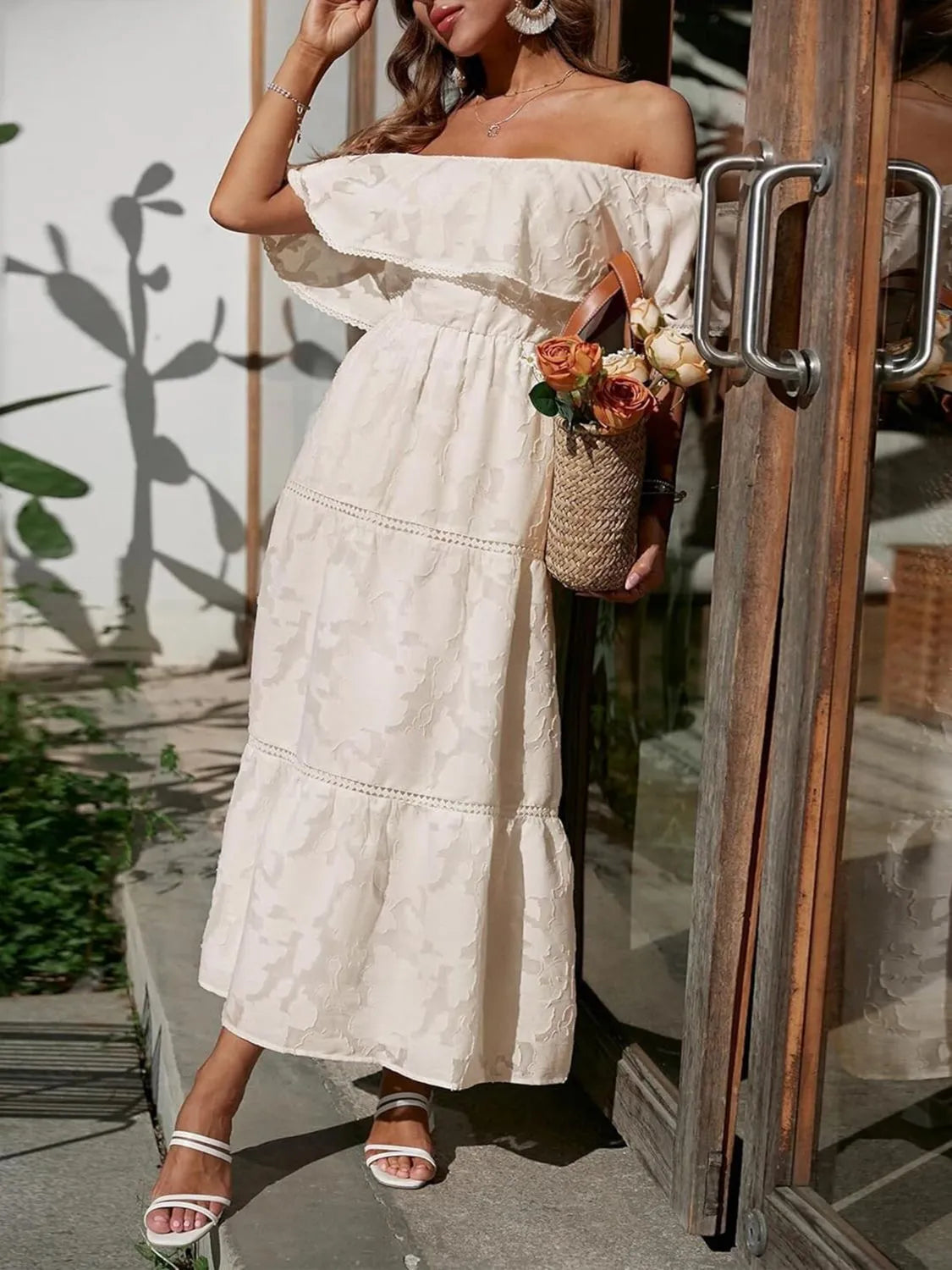 Women's tiered maxi dress close-up of layered skirt detail