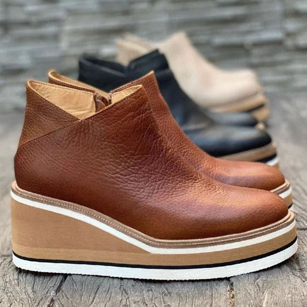 Platform wedge Chelsea ankle boots with a layered wedge platform