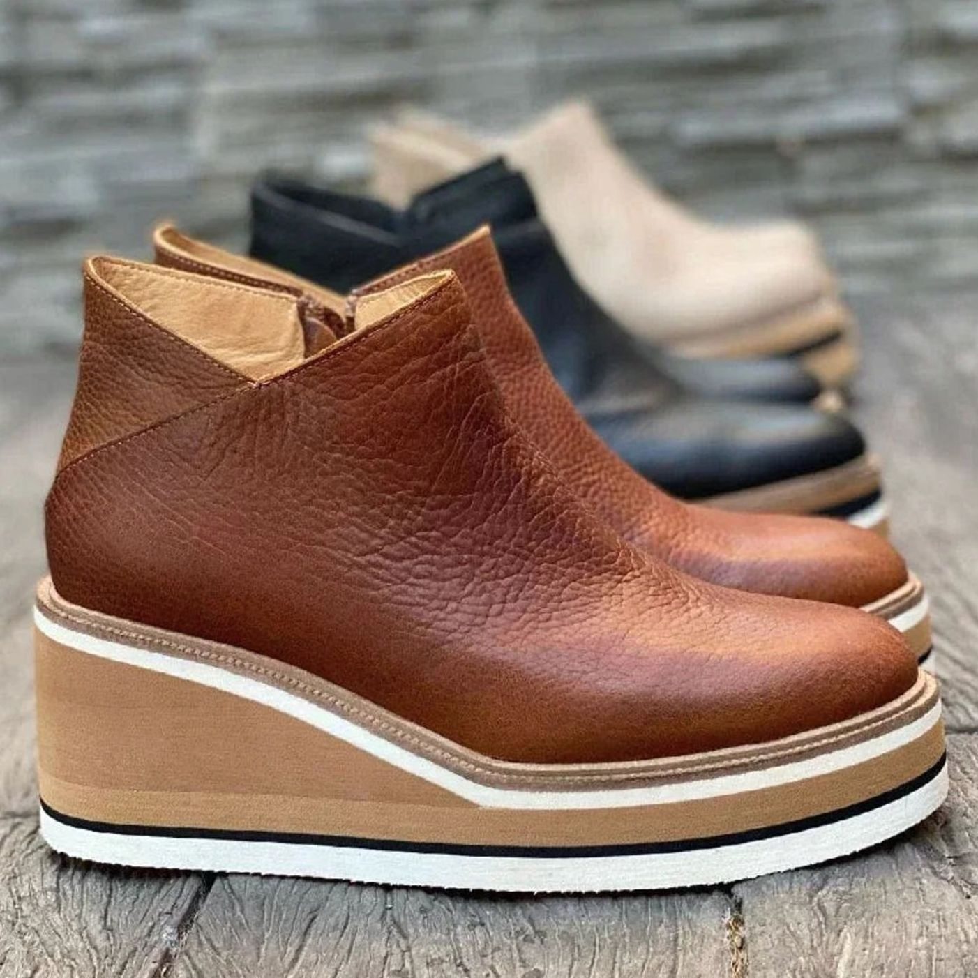 Platform wedge Chelsea ankle boots with a layered wedge platform