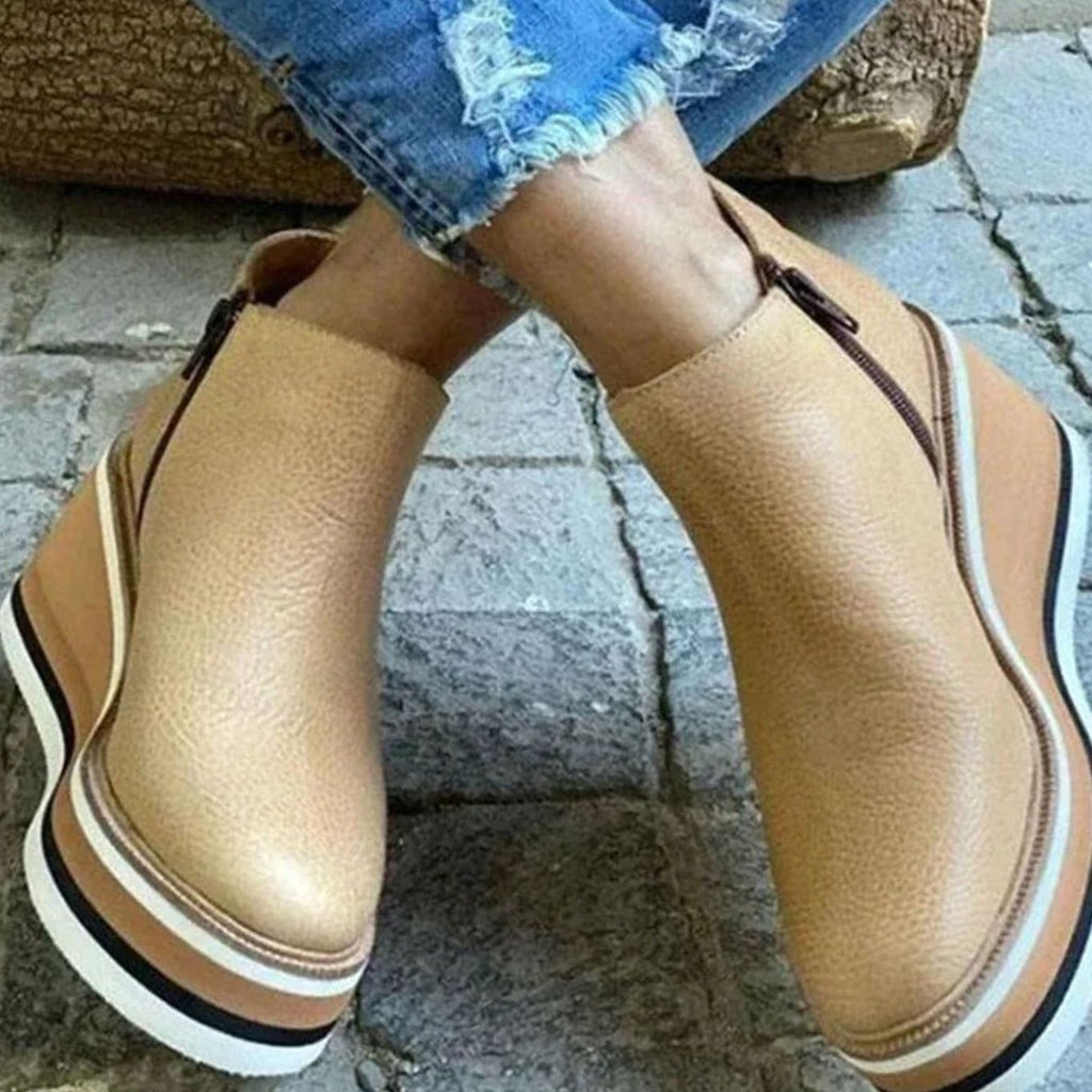Platform wedge Chelsea ankle boots with a layered wedge platform