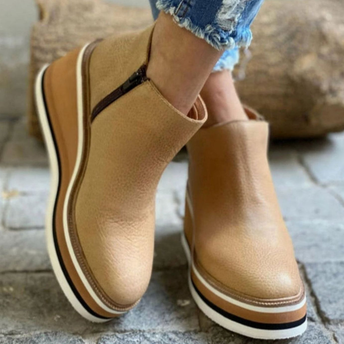 Platform wedge Chelsea ankle boots with a faux leather upper