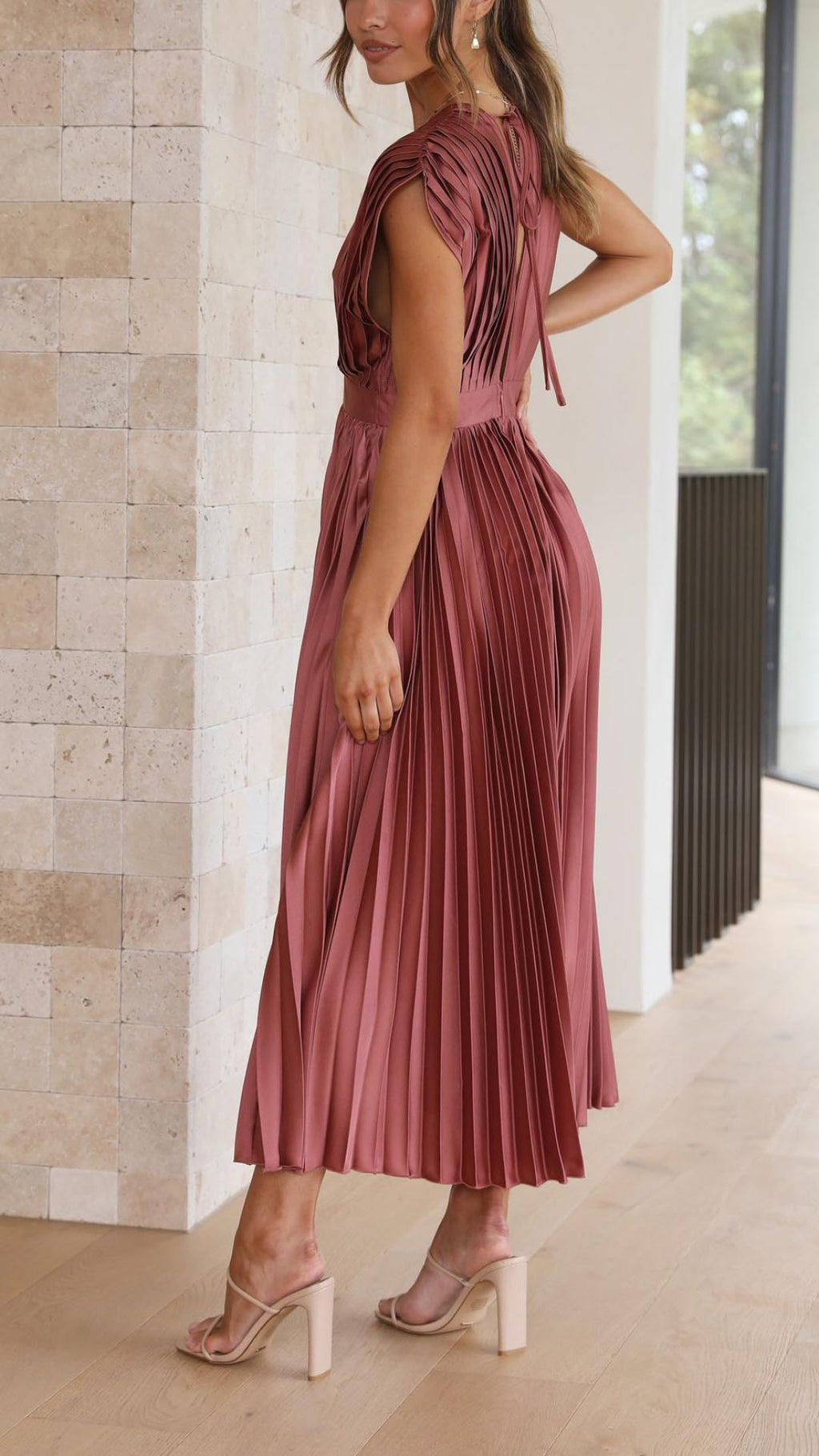 Women's pleated midi dress side view