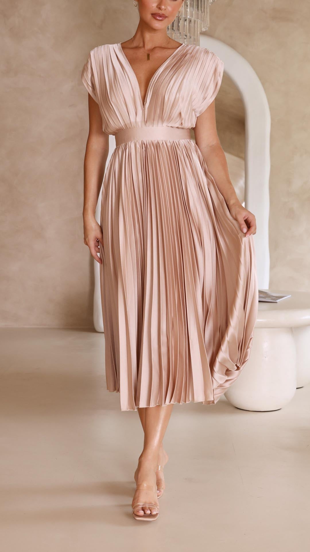 Women's V-neck pleated midi dress styled for weddings