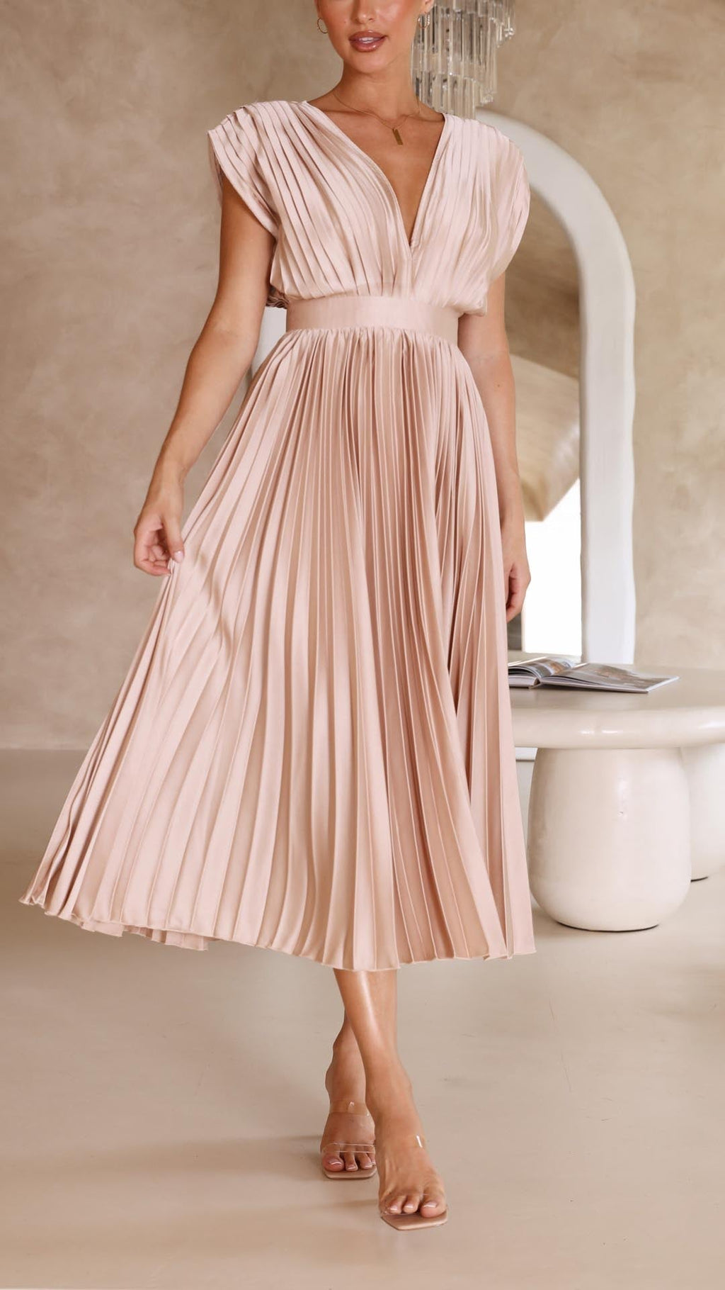 Elegant pleated midi dress graceful movement
