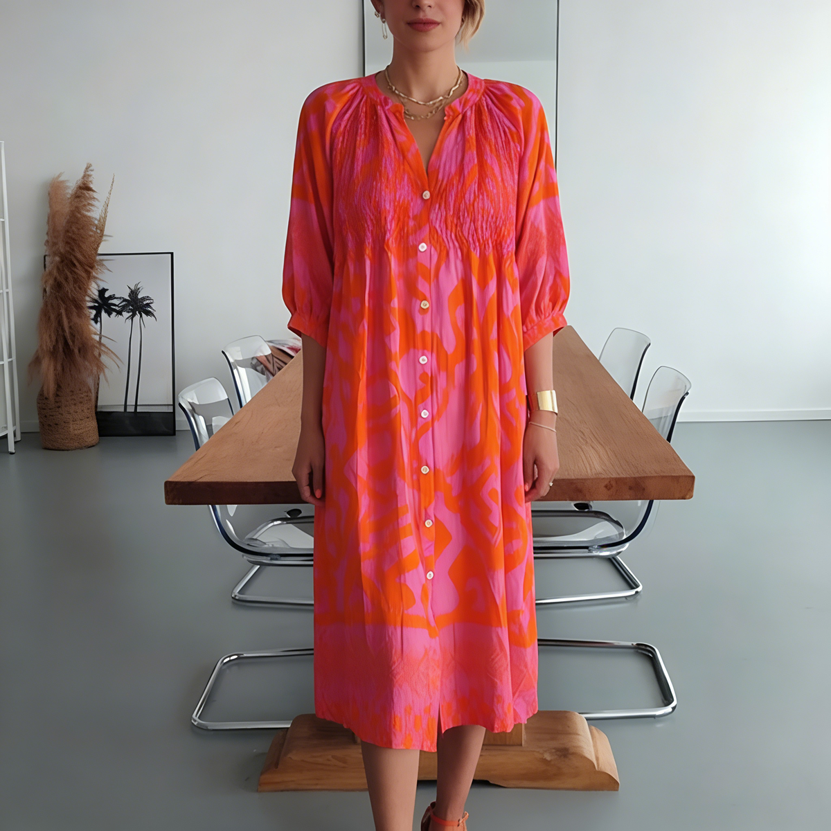 Vibrant wedding guest midi dress in hot pink print, full length product shot